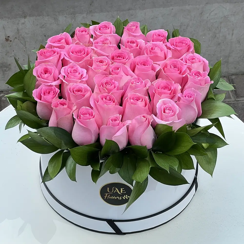 30 pink roses in a white round box