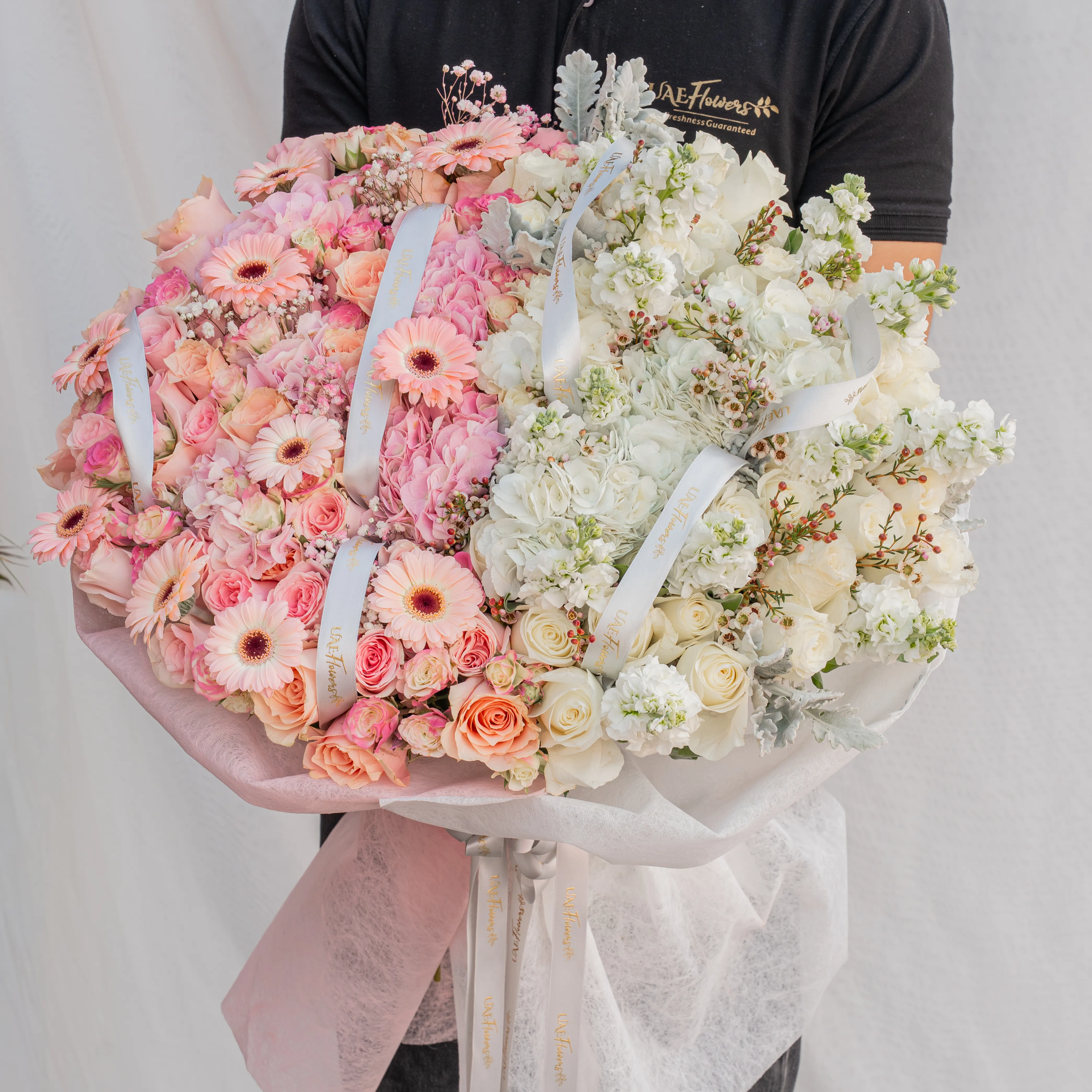 bouquet of pink hydrangeas, roses, gerberas, spray roses