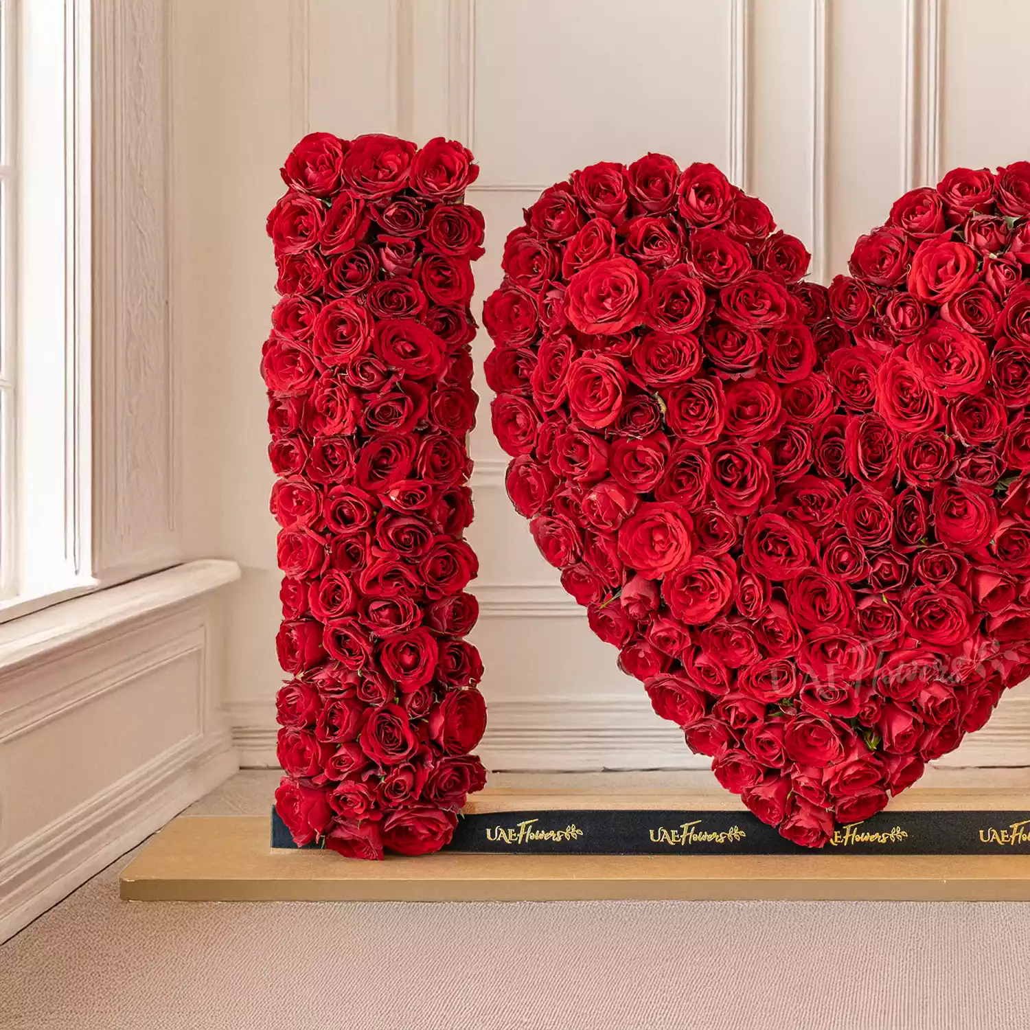 350 red spray rose buds arranged in an I Love You shape