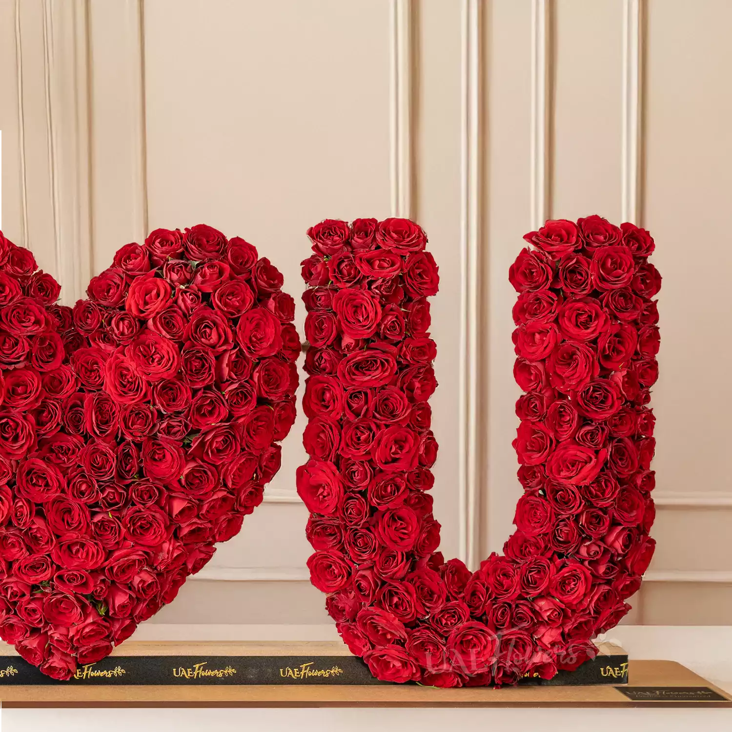 350 red spray rose buds arranged in an I Love You shape