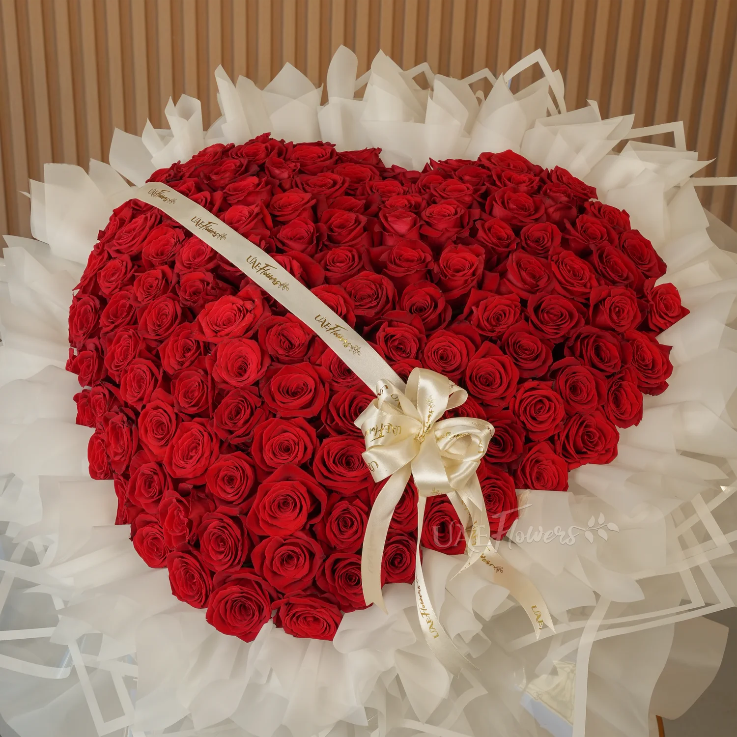 heart-shaped arrangement of 120 red rose