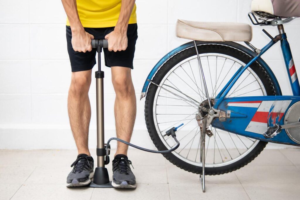 Men Air Pumping His Bycycle