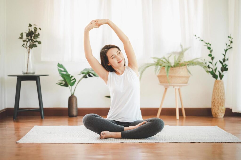 A Woman Exercising in the Morning is a helpful Tips To Stay Productive